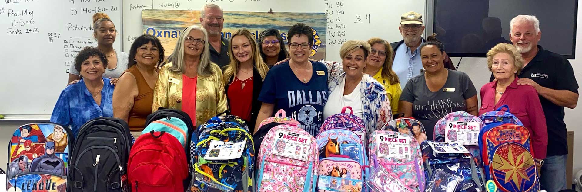 Group with backpacks for charity.